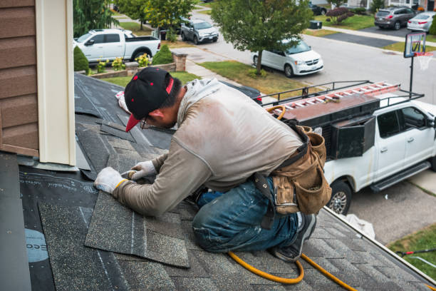 Professional Roofing technician working in Burlington, IL